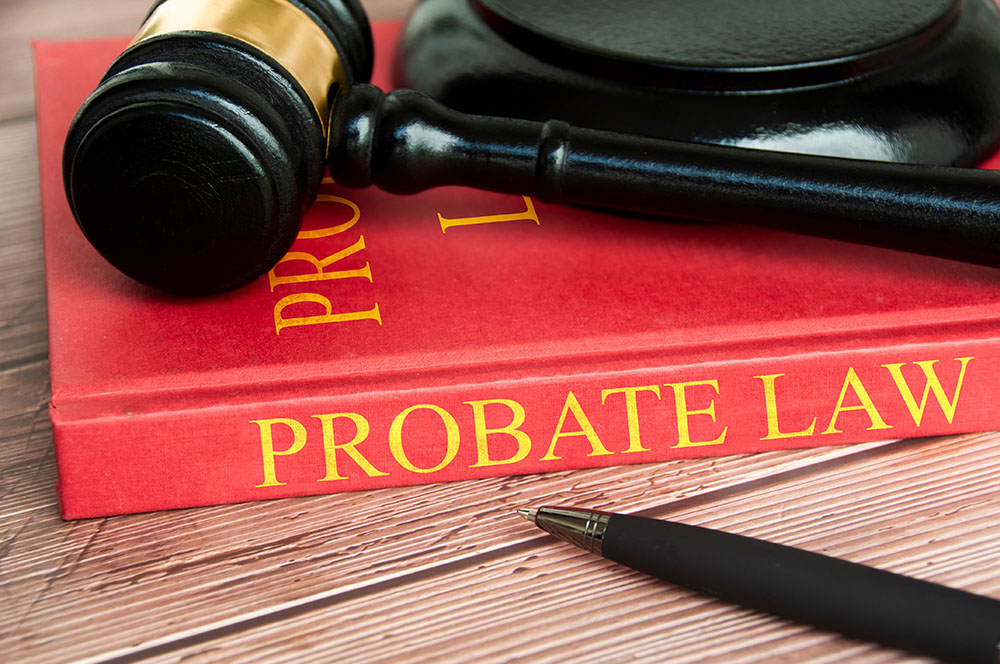 Judge's gavel sitting on probate law book